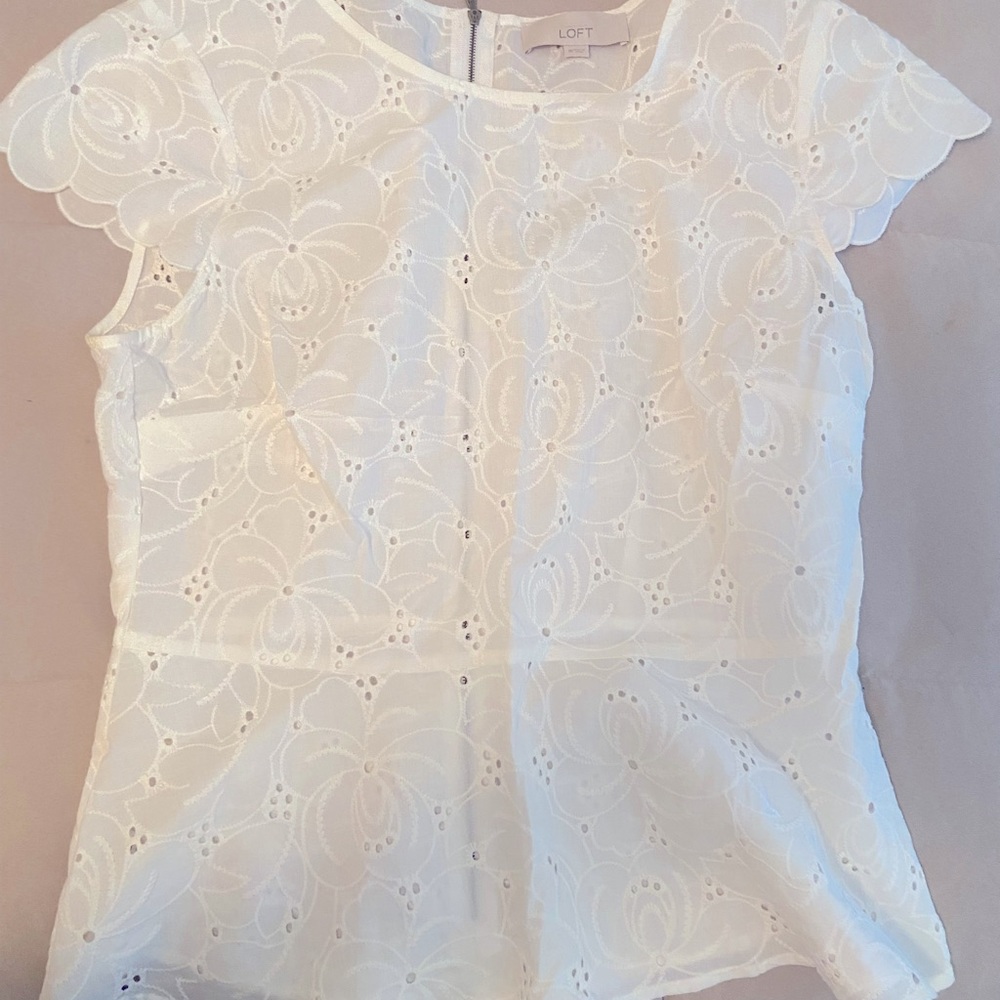 White eyelet peplum top